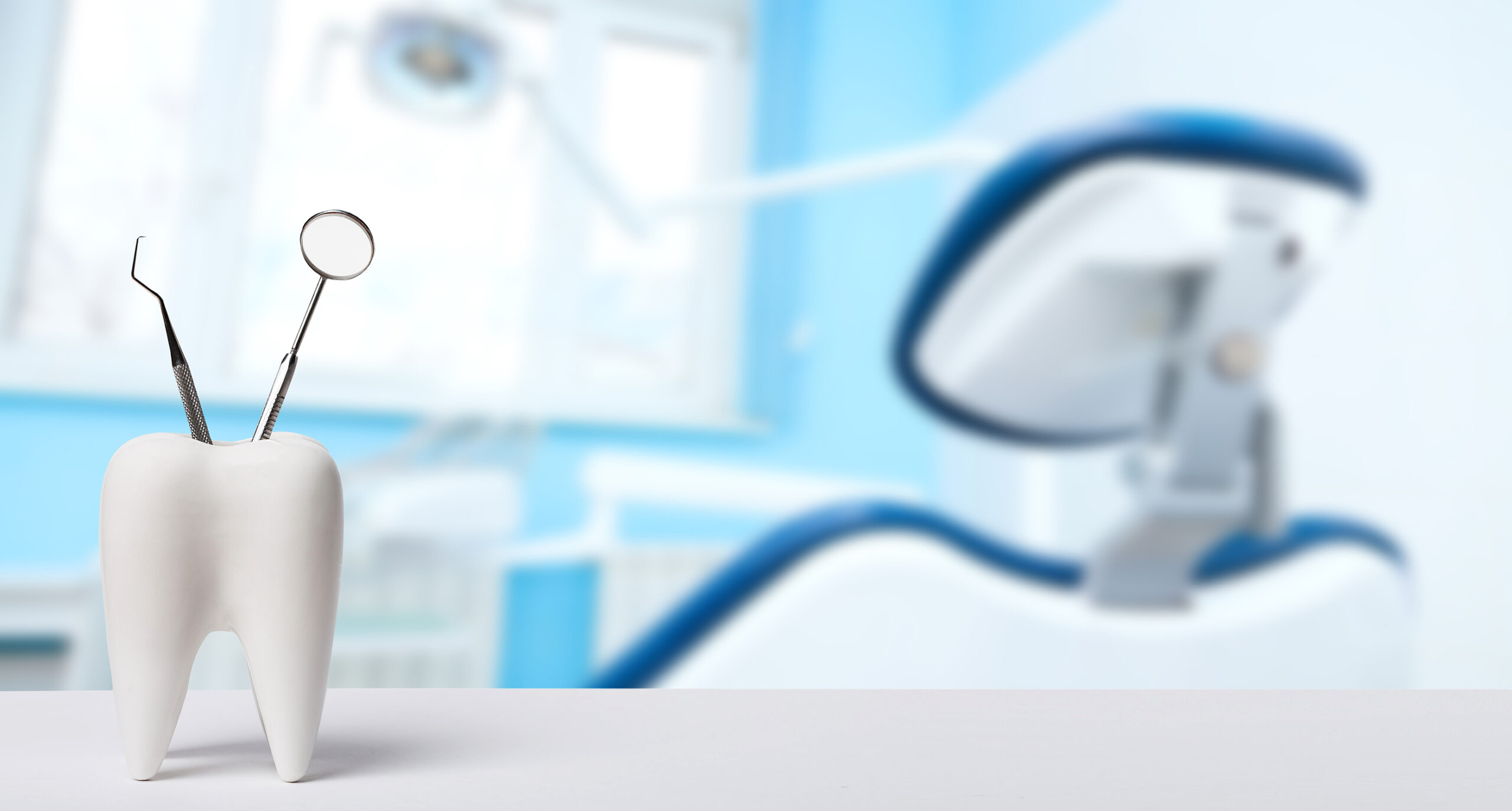 Oral Dental Hygiene. Healthy White Tooth And Dentist Mirror With dental office