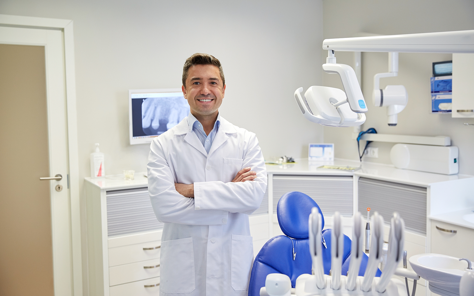 dentist with arms crossed